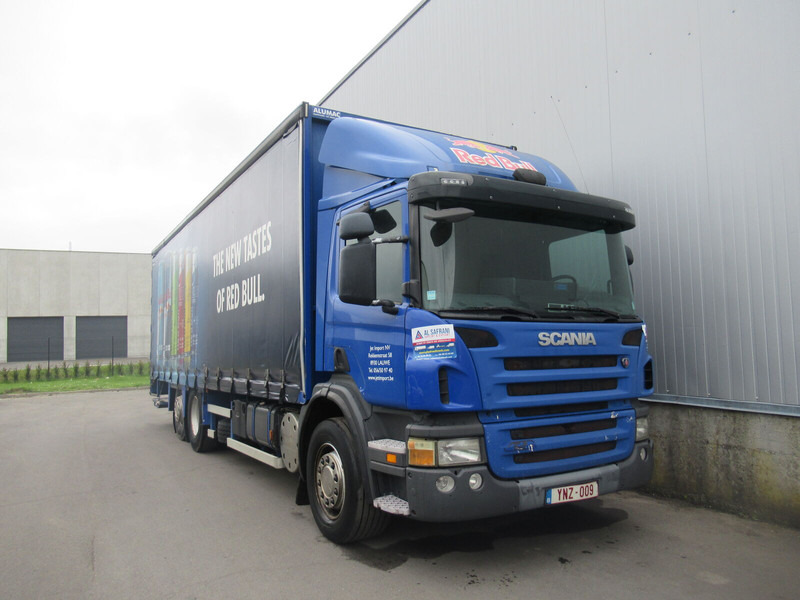 Scania p310 - Camião de lona: foto 1 Scania p310 - Camião de lona: foto 1