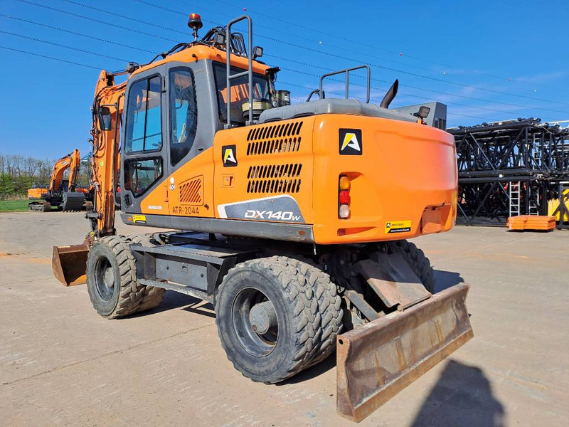 Doosan DX140W-5 - Escavadeira de rodas: foto 2 Doosan DX140W-5 - Escavadeira de rodas: foto 2