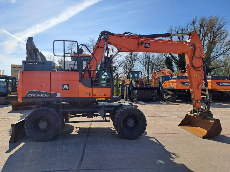 Doosan DX140W-5 - Escavadeira de rodas: foto 5 Doosan DX140W-5 - Escavadeira de rodas: foto 5