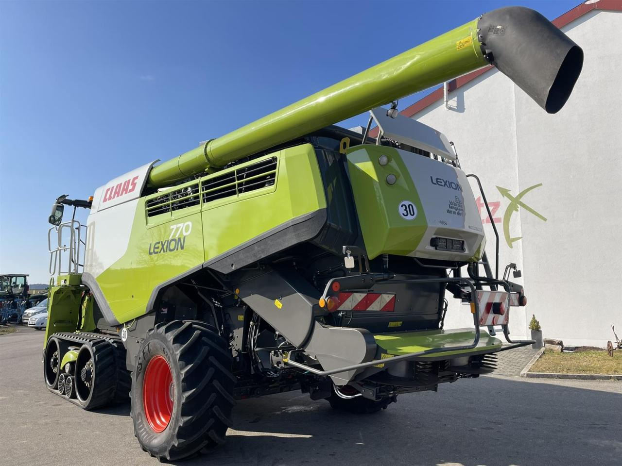 CLAAS Lexion 770TT Modell C76 mit CEMOS AUTOMATIC und Schneidwerk V1230 - Ceifeira debulhadora: foto 4 CLAAS Lexion 770TT Modell C76 mit CEMOS AUTOMATIC und Schneidwerk V1230 - Ceifeira debulhadora: foto 4
