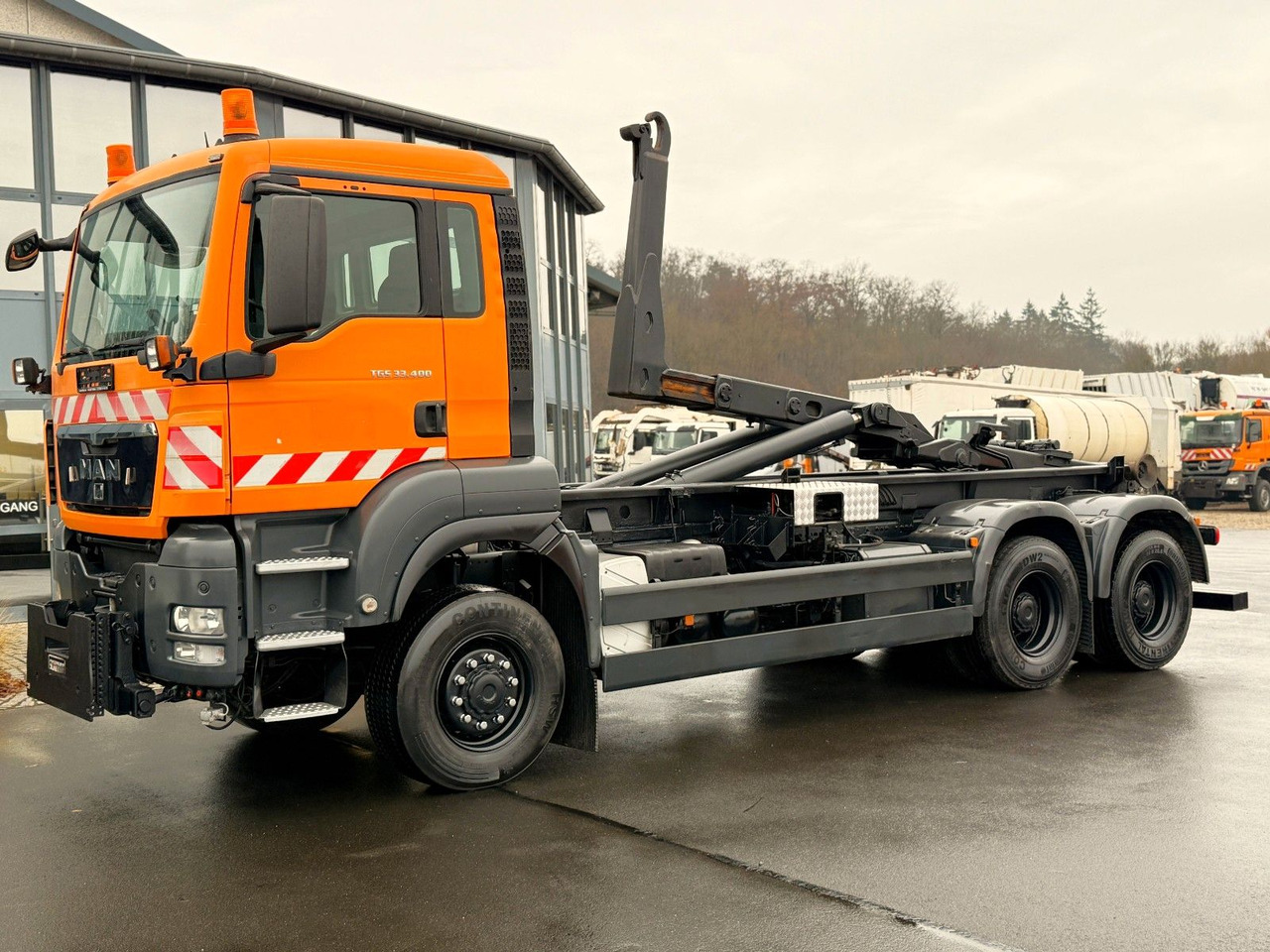 MAN TGS 33.400 6x6 Blattfederung Original 120500 km - Camião polibenne: foto 1 MAN TGS 33.400 6x6 Blattfederung Original 120500 km - Camião polibenne: foto 1