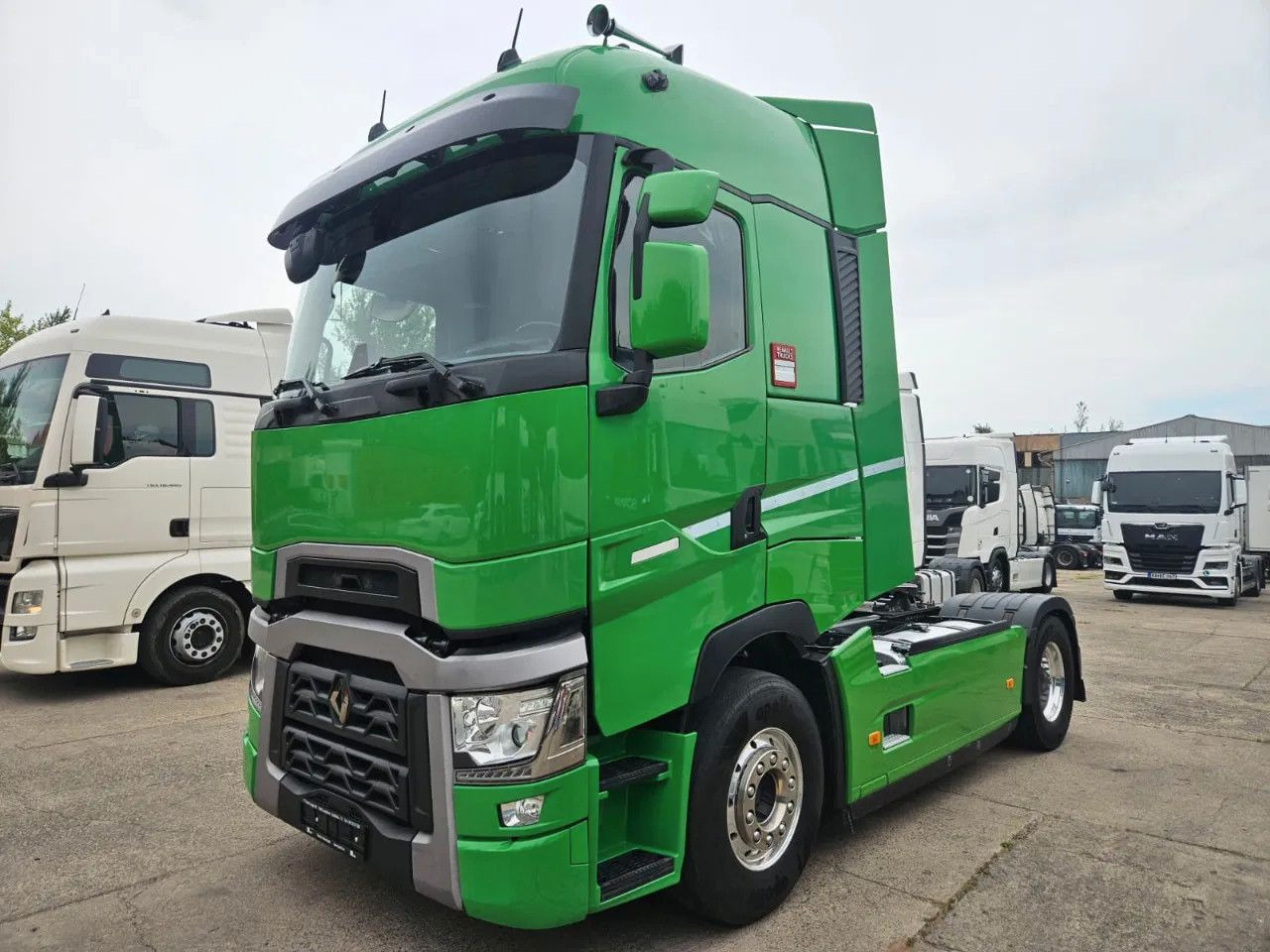 Renault T520 HSC, Navi, Standklima, Horns, Full Spoiler, - Tractor: foto 1 Renault T520 HSC, Navi, Standklima, Horns, Full Spoiler, - Tractor: foto 1