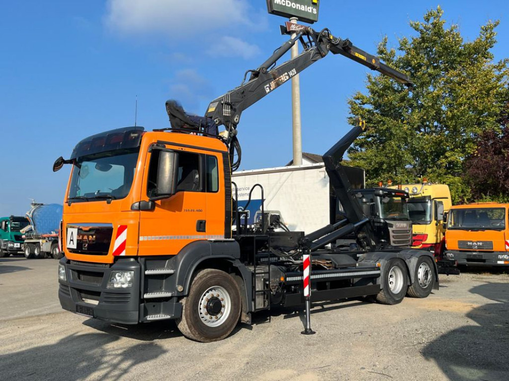 MAN TG-S 26.400 6x4H-2 BL Abrollkipper mit Kran Lift Lenk - Camião polibenne, Camião grua: foto 1 MAN TG-S 26.400 6x4H-2 BL Abrollkipper mit Kran Lift Lenk - Camião polibenne, Camião grua: foto 1