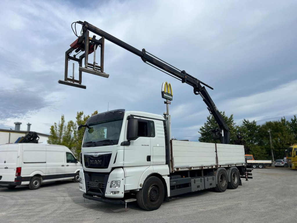 MAN TG-X 26.440 6x4 Pritsche Heckkran Hiab XS 166 - Camião de caixa aberta/ Plataforma, Camião grua: foto 1 MAN TG-X 26.440 6x4 Pritsche Heckkran Hiab XS 166 - Camião de caixa aberta/ Plataforma, Camião grua: foto 1