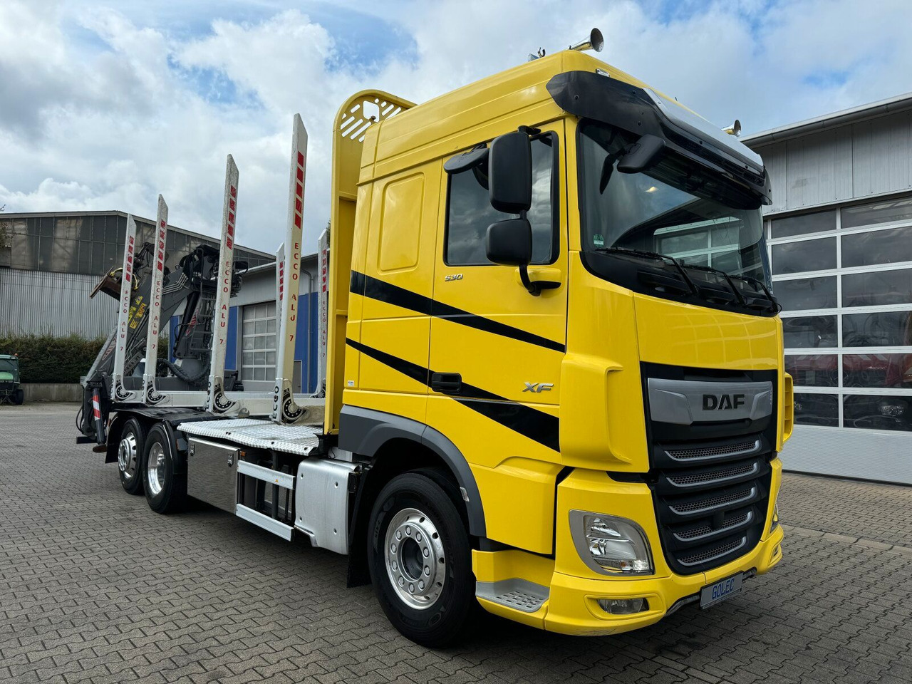 DAF XF 530 6x2 Holztransport Kran PENZ 15Z9.50 *Anh. - Camião de transporte de madeira, Camião grua: foto 1 DAF XF 530 6x2 Holztransport Kran PENZ 15Z9.50 *Anh. - Camião de transporte de madeira, Camião grua: foto 1