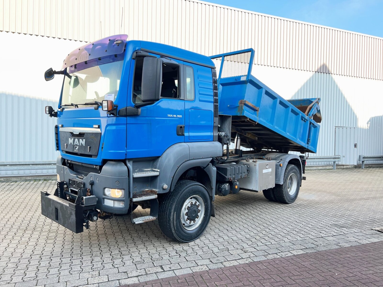 MAN TGS 18.360 4X4 BL TGS 18.360 4X4 BL, Hinterkipper, hydr. Heckklappe, Winterdienstausstattung - Camião basculante: foto 1 MAN TGS 18.360 4X4 BL TGS 18.360 4X4 BL, Hinterkipper, hydr. Heckklappe, Winterdienstausstattung - Camião basculante: foto 1