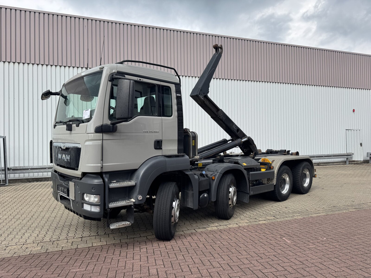 MAN TGS 35.480 8x4 BL TGS 35.480 8x4 BL, Meiller RK 30.62 bis 6,5 m Beh. - Camião polibenne: foto 1 MAN TGS 35.480 8x4 BL TGS 35.480 8x4 BL, Meiller RK 30.62 bis 6,5 m Beh. - Camião polibenne: foto 1