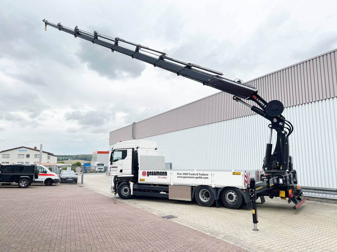 Camião grua, Camião de caixa aberta/ Plataforma novo MAN TGX 26.510 6x2-4 LL CH TGX 26.510 6x2-4 LL, Kran Hiab X-HiPro 548 E-8, Lenk-/Liftachse, TwistLock 20Fuß, Funk, Retarder: foto 8