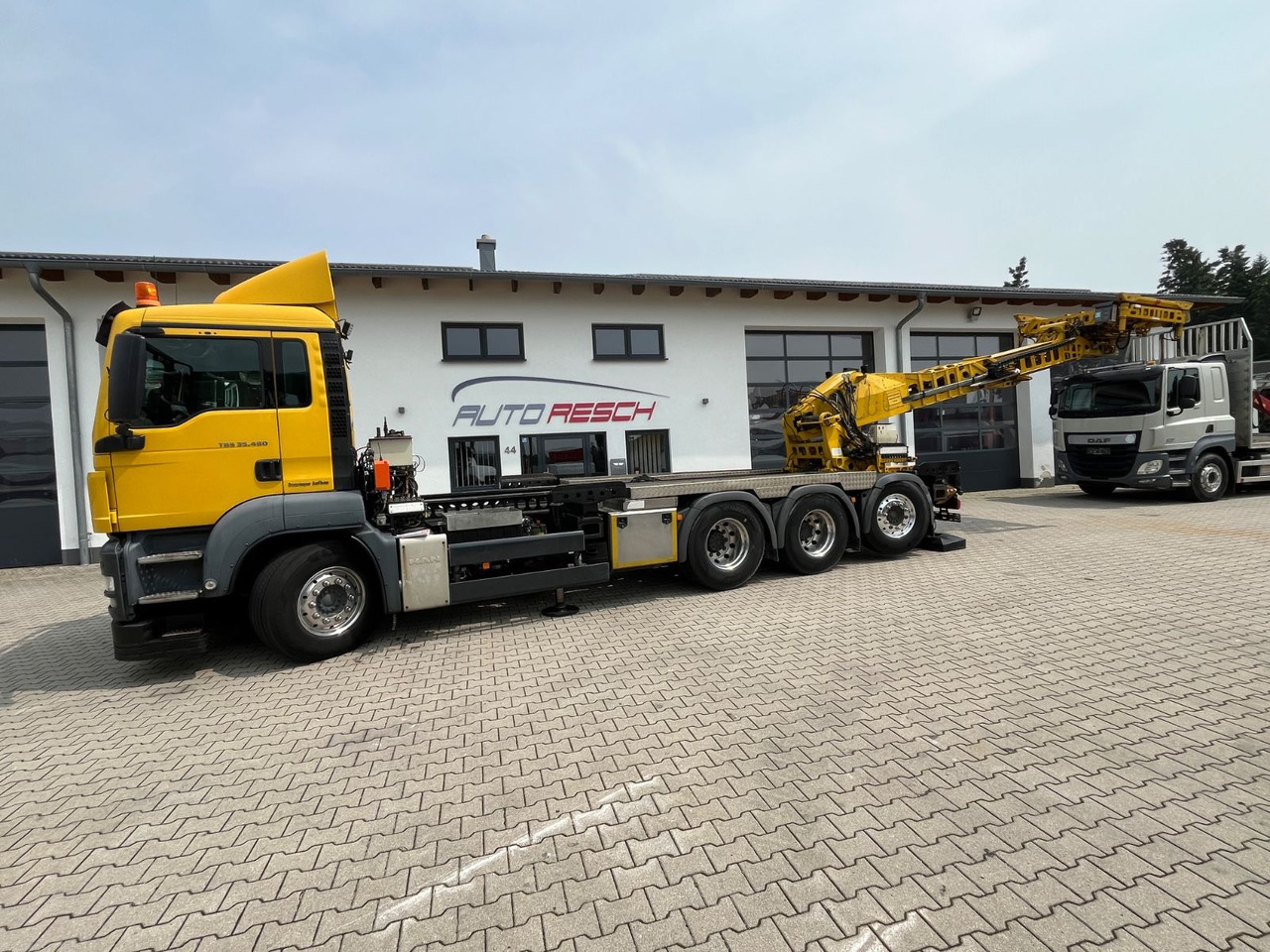 MAN TGS 35.480 8x4-4BL Deuringer Garagentransporter - Camião grua: foto 4 MAN TGS 35.480 8x4-4BL Deuringer Garagentransporter - Camião grua: foto 4