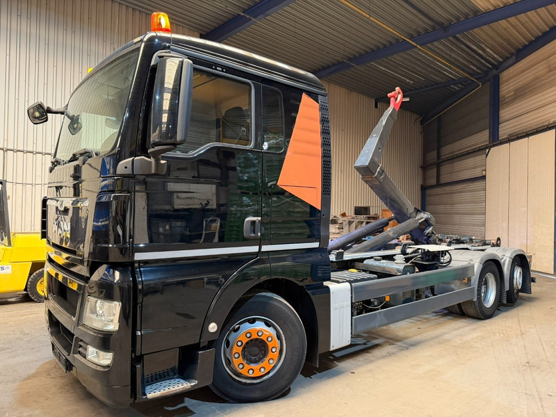 MAN TGX 26.400 6X2 + HOOKLIFT PALIFT 20T - LIFT + STEERING AXLE - EURO 5 - SLEEPERCAB - BE TRUCK - Camião polibenne: foto 1 MAN TGX 26.400 6X2 + HOOKLIFT PALIFT 20T - LIFT + STEERING AXLE - EURO 5 - SLEEPERCAB - BE TRUCK - Camião polibenne: foto 1