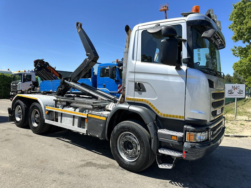 Scania G450 6x4 HOOKLIFT AJK 20T - 5760mm - 3m90 WB - HUB REDUCTION / STEEL SUSP. - EURO 6 - BE TRUCK - Camião polibenne: foto 1 Scania G450 6x4 HOOKLIFT AJK 20T - 5760mm - 3m90 WB - HUB REDUCTION / STEEL SUSP. - EURO 6 - BE TRUCK - Camião polibenne: foto 1