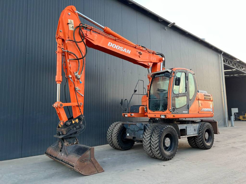 Doosan DX170W - Escavadeira de rodas: foto 1 Doosan DX170W - Escavadeira de rodas: foto 1