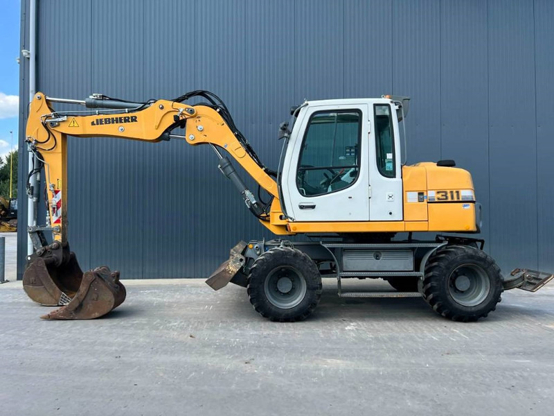 Liebherr A311 Litronic - Escavadeira de rodas: foto 5 Liebherr A311 Litronic - Escavadeira de rodas: foto 5