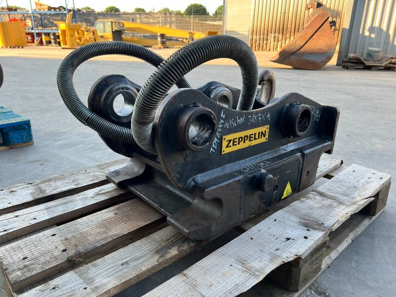 OilQuick OQ65 - 311F / 313F / 315F - Acoplamento rápido por Máquina de construção: foto 4 OilQuick OQ65 - 311F / 313F / 315F - Acoplamento rápido por Máquina de construção: foto 4