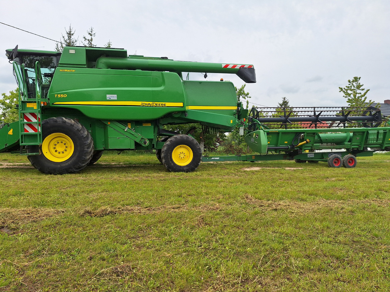 John Deere T550 - Ceifeira debulhadora: foto 1 John Deere T550 - Ceifeira debulhadora: foto 1