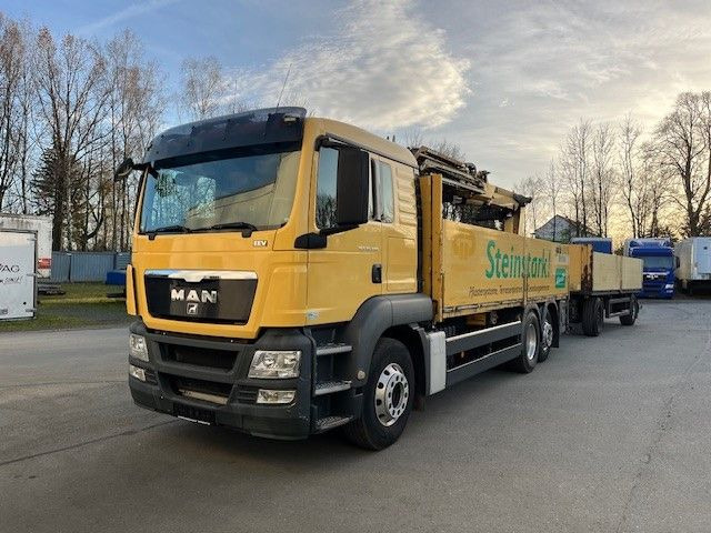 MAN TGS 26.400 Baustoff LKW mit Ladekran Atlas 210.2 - Camião grua, Camião de caixa aberta/ Plataforma: foto 1 MAN TGS 26.400 Baustoff LKW mit Ladekran Atlas 210.2 - Camião grua, Camião de caixa aberta/ Plataforma: foto 1