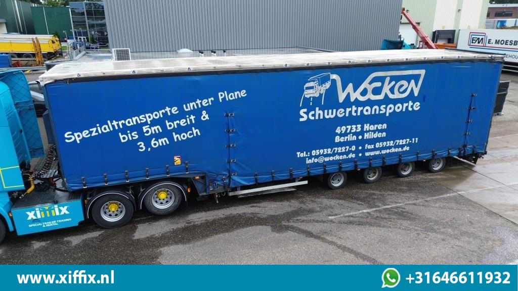 Dinkel 4-ass. Semi dieplader met elektrische huifopbouw / 2x naloop gestuurd - Semi-reboque baixa: foto 1 Dinkel 4-ass. Semi dieplader met elektrische huifopbouw / 2x naloop gestuurd - Semi-reboque baixa: foto 1