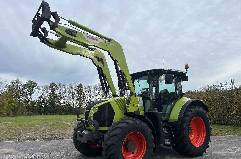 Claas Arion 640 cis, lucht, frontlader - Trator: foto 1 Claas Arion 640 cis, lucht, frontlader - Trator: foto 1