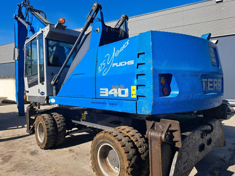 Fuchs MHL 340 D - Manipulador de material: foto 1 Fuchs MHL 340 D - Manipulador de material: foto 1
