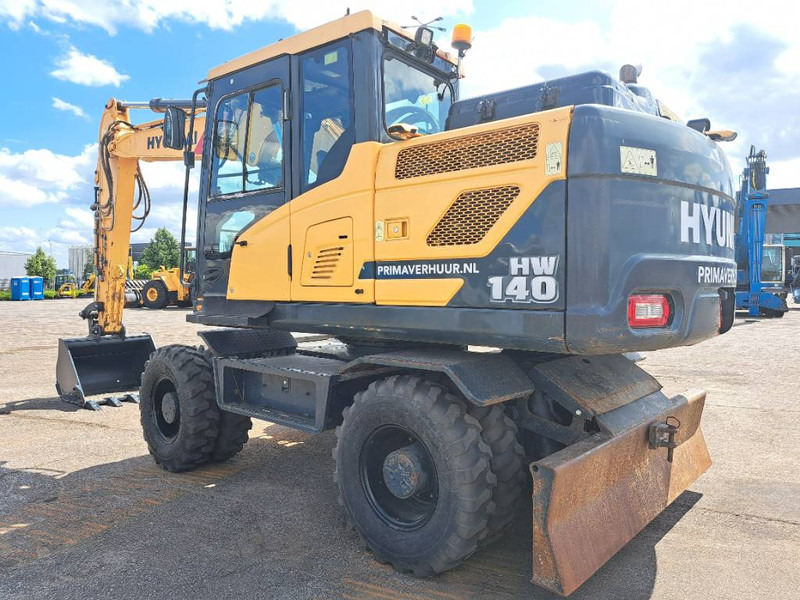 Hyundai HW140 - Escavadeira de rodas: foto 1 Hyundai HW140 - Escavadeira de rodas: foto 1