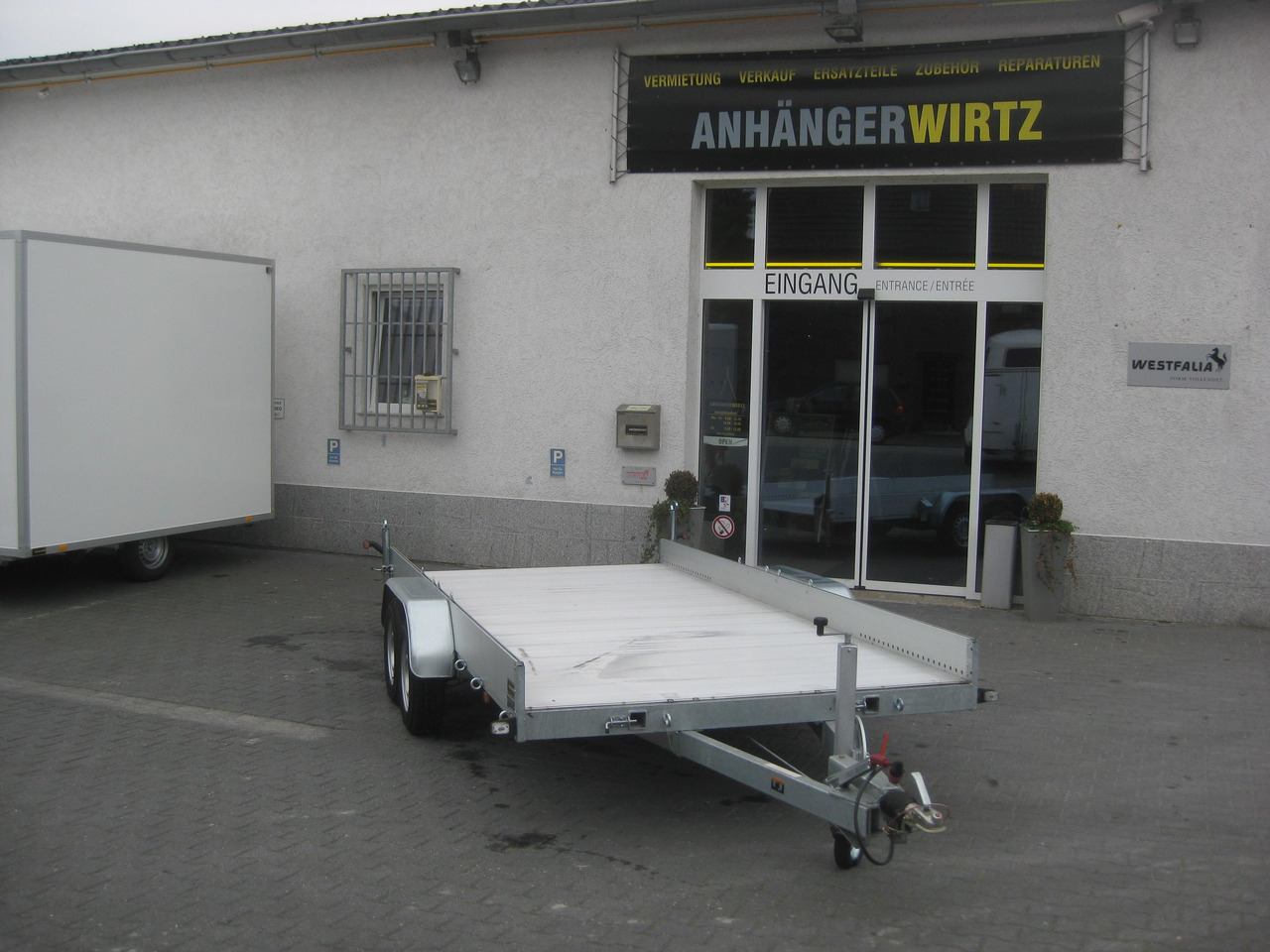 Anssems Transporter AMT 2500 440x190x18cm Aluboden Alurampen Seilwinde 2500kg Modell 22 - Reboque plataforma/ Caixa aberta: foto 1 Anssems Transporter AMT 2500 440x190x18cm Aluboden Alurampen Seilwinde 2500kg Modell 22 - Reboque plataforma/ Caixa aberta: foto 1