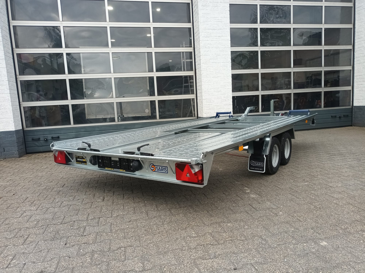 Saris Cartrailer AT 401 202 2700 2 K easyload ankippbar Rampen Fahrschienen Radstop 2700kg 100km/H - Reboque transporte de veículos: foto 5 Saris Cartrailer AT 401 202 2700 2 K easyload ankippbar Rampen Fahrschienen Radstop 2700kg 100km/H - Reboque transporte de veículos: foto 5
