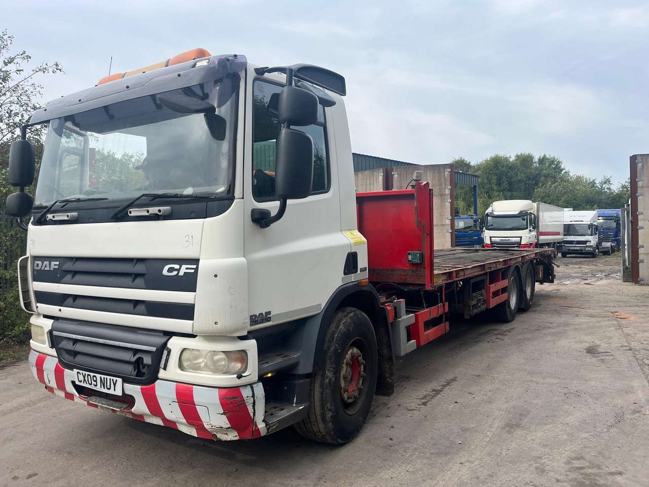 DAF 75 CF 310 - Camião de caixa aberta/ Plataforma: foto 1 DAF 75 CF 310 - Camião de caixa aberta/ Plataforma: foto 1