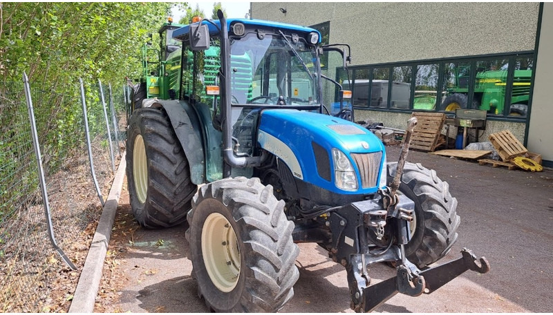 New Holland TN 95 D A - Trator: foto 1 New Holland TN 95 D A - Trator: foto 1
