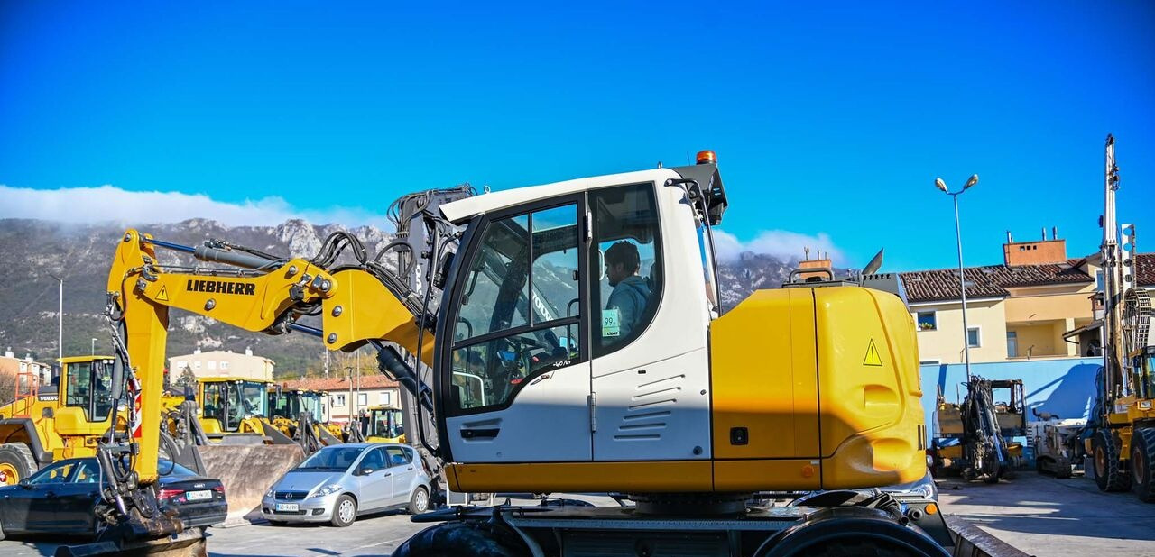 Liebherr A910 - Escavadeira de rodas: foto 3 Liebherr A910 - Escavadeira de rodas: foto 3