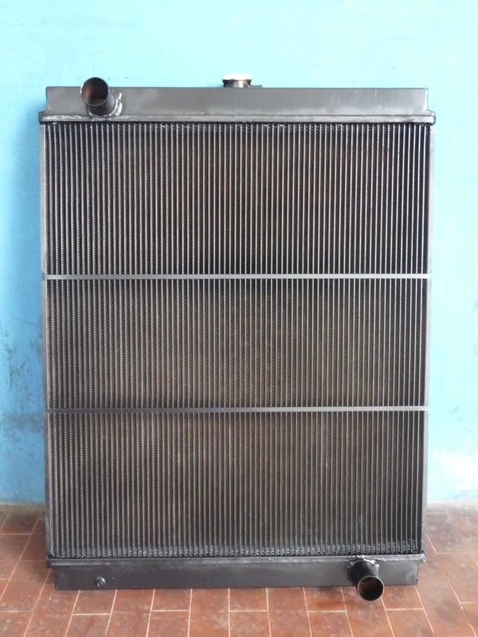 • RADIATORE NEW HOLLAND E195/215/245/ 87339771-72210130 - Radiador: foto 1 • RADIATORE NEW HOLLAND E195/215/245/ 87339771-72210130 - Radiador: foto 1
