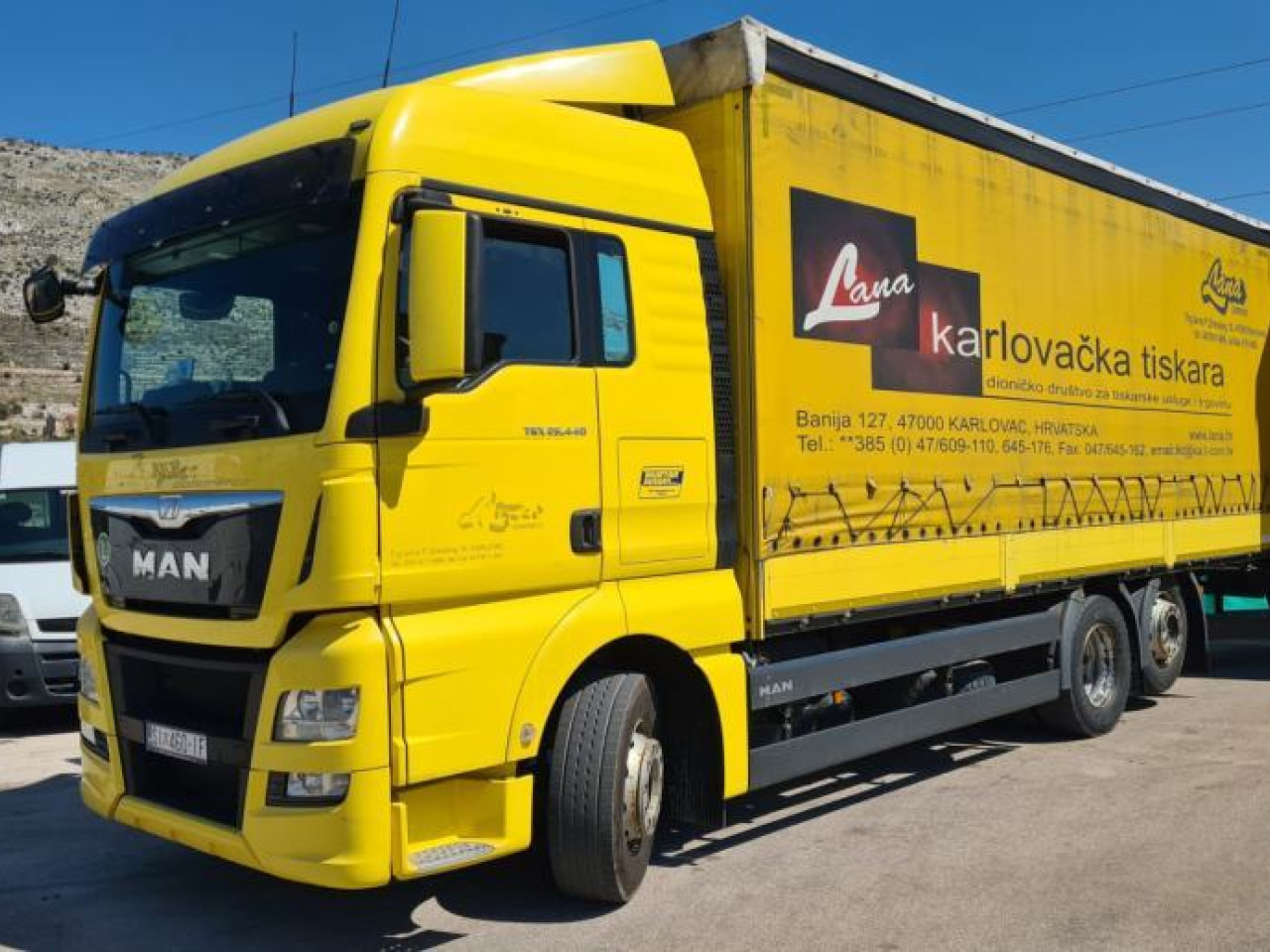 MAN TGX 26.440 - Camião de lona: foto 1 MAN TGX 26.440 - Camião de lona: foto 1