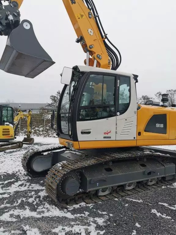 2023 Liebherr R 918 Litronic - Escavadeira de rodas: foto 1 2023 Liebherr R 918 Litronic - Escavadeira de rodas: foto 1