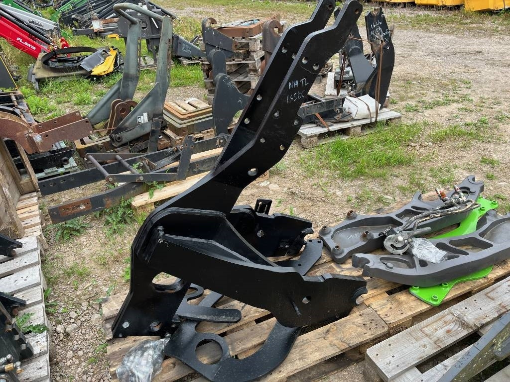 Lastarfäste Trima Ålö Quicke till New Holland T6 1 - Carregador frontal para o trator: foto 3 Lastarfäste Trima Ålö Quicke till New Holland T6 1 - Carregador frontal para o trator: foto 3