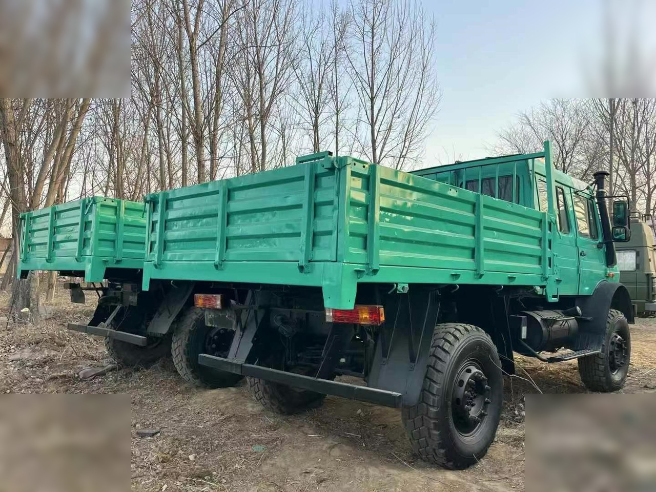 2009 MERCEDES-BENZ UNIMOG 5000 - Camião de caixa aberta/ Plataforma: foto 2 2009 MERCEDES-BENZ UNIMOG 5000 - Camião de caixa aberta/ Plataforma: foto 2