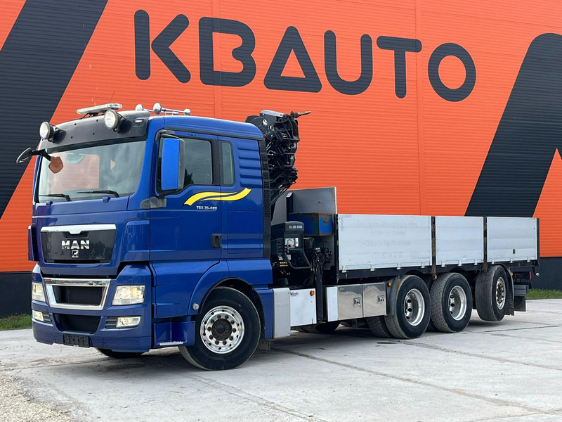 MAN TGX 35.480 8x4*4 HIAB 288E-7 / PLATFORM L=6397 mm - Camião de caixa aberta/ Plataforma, Camião grua: foto 2 MAN TGX 35.480 8x4*4 HIAB 288E-7 / PLATFORM L=6397 mm - Camião de caixa aberta/ Plataforma, Camião grua: foto 2