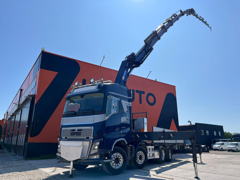 Volvo FH 16 650 8x2*6 HMF 6020K-RC + JIB / PLATFORM L=6344 mm - Camião de caixa aberta/ Plataforma, Camião grua: foto 1 Volvo FH 16 650 8x2*6 HMF 6020K-RC + JIB / PLATFORM L=6344 mm - Camião de caixa aberta/ Plataforma, Camião grua: foto 1