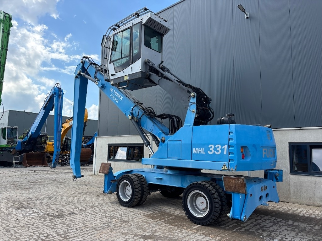 Fuchs MHL 331 D - MHL 335 - MHL 340 - Manipulador de material: foto 2 Fuchs MHL 331 D - MHL 335 - MHL 340 - Manipulador de material: foto 2