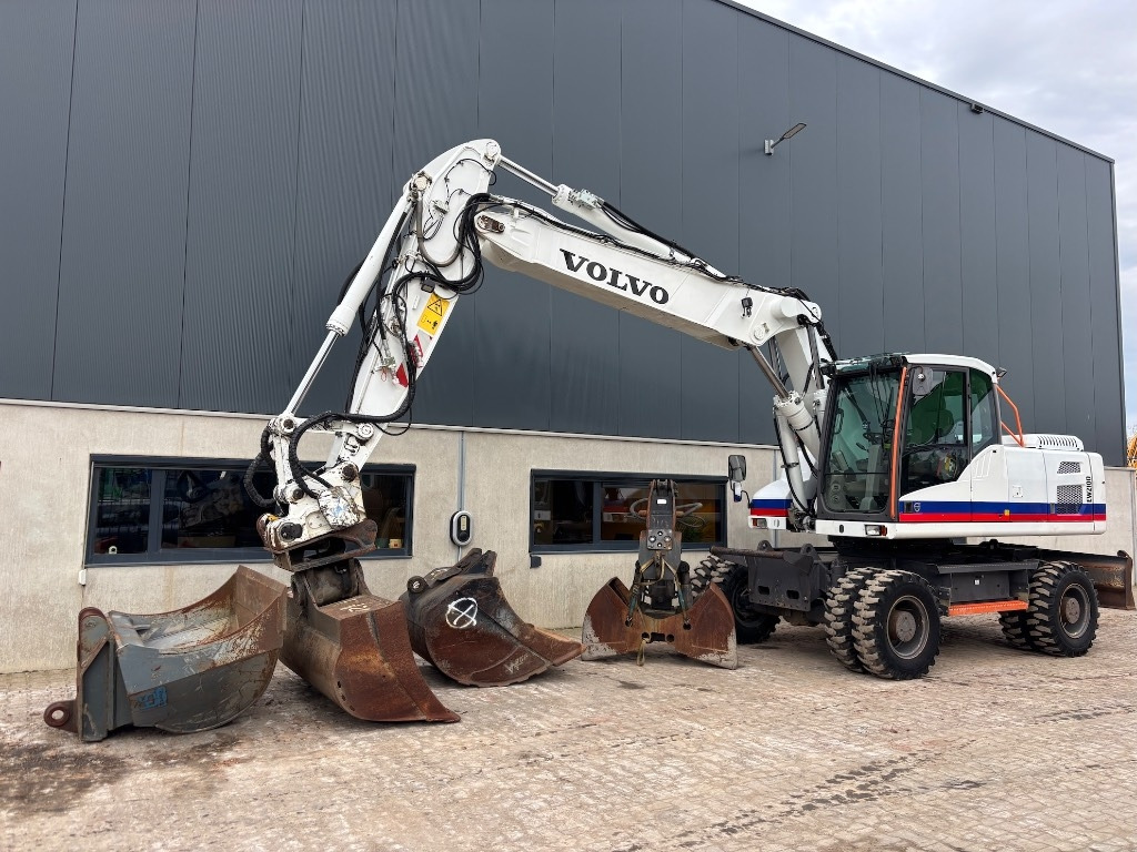 Volvo EW 210 D - EW210 - EW210D - EW 180 - EW 240 - Escavadeira de rodas: foto 1 Volvo EW 210 D - EW210 - EW210D - EW 180 - EW 240 - Escavadeira de rodas: foto 1
