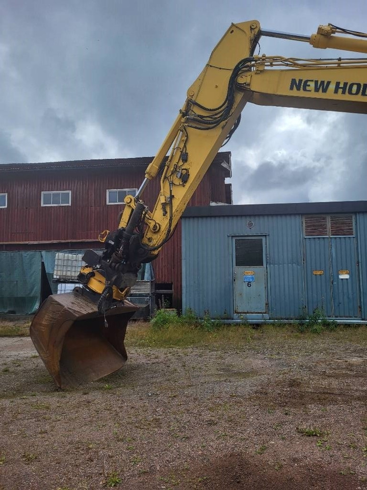 New Holland Kobelco E 235 B SR-2 - Escavadora de rastos: foto 4 New Holland Kobelco E 235 B SR-2 - Escavadora de rastos: foto 4