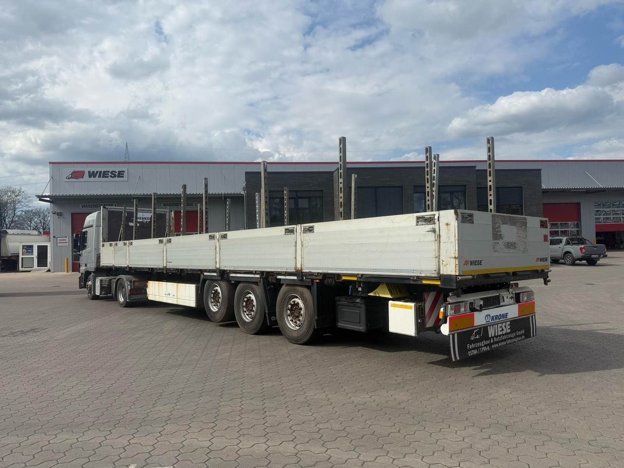 Krone Stahlmattenauflieger mit Bordwände - TÜV Neu - Semi-reboque plataforma/ Caixa aberta: foto 1 Krone Stahlmattenauflieger mit Bordwände - TÜV Neu - Semi-reboque plataforma/ Caixa aberta: foto 1