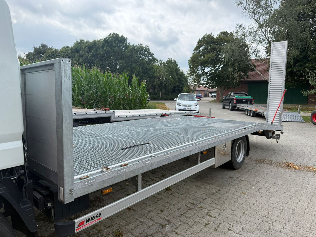 Mitsubishi Fuso Canter 7C18 Arbeitsbühnentransporter - Camião transporte de veículos: foto 4 Mitsubishi Fuso Canter 7C18 Arbeitsbühnentransporter - Camião transporte de veículos: foto 4