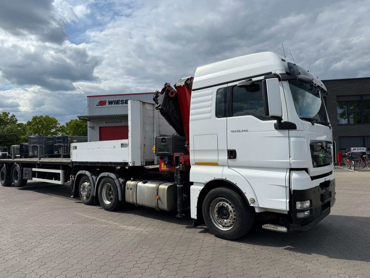 MAN TGX 26.440 6x2 mit HMF 3000-5 Kran - Tractor: foto 1 MAN TGX 26.440 6x2 mit HMF 3000-5 Kran - Tractor: foto 1