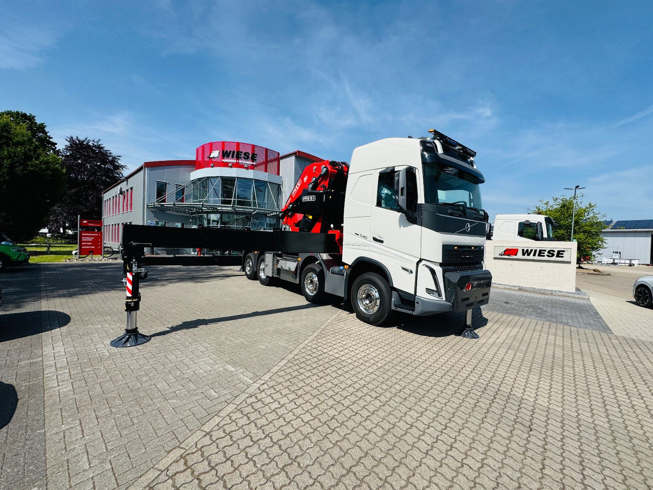 Volvo FH 540 mit Fassi F2150RAL Fly Jib + Winde - Camião de caixa aberta/ Plataforma, Camião grua: foto 1 Volvo FH 540 mit Fassi F2150RAL Fly Jib + Winde - Camião de caixa aberta/ Plataforma, Camião grua: foto 1