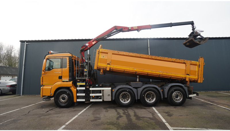 MAN TGS 35.440 8X4 2 SIDE TIPPER WITH HMF Z 1943 CRANE 415.000KM - Camião grua: foto 1 MAN TGS 35.440 8X4 2 SIDE TIPPER WITH HMF Z 1943 CRANE 415.000KM - Camião grua: foto 1
