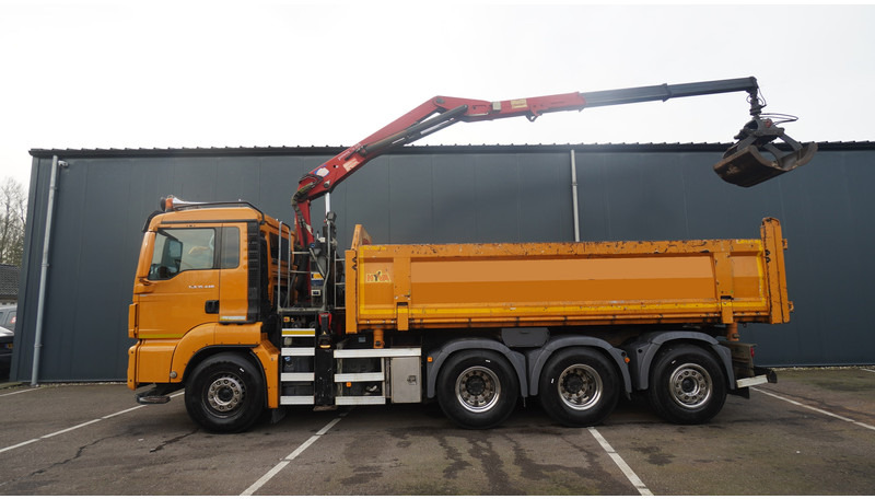 MAN TGS 35.440 8X4 2 SIDE TIPPER WITH HMF Z 1943 CRANE 415.000KM - Camião grua: foto 2 MAN TGS 35.440 8X4 2 SIDE TIPPER WITH HMF Z 1943 CRANE 415.000KM - Camião grua: foto 2