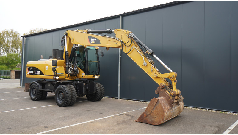 Caterpillar M318D 4X4 WHEELED EXCAVATOR - Máquina de construção: foto 4 Caterpillar M318D 4X4 WHEELED EXCAVATOR - Máquina de construção: foto 4