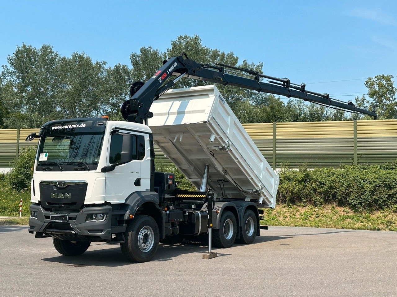 MAN TGS 33.440 6x4 /3-Seiten- Kipper / HIAB 228-6 - Camião basculante, Camião grua: foto 1 MAN TGS 33.440 6x4 /3-Seiten- Kipper / HIAB 228-6 - Camião basculante, Camião grua: foto 1