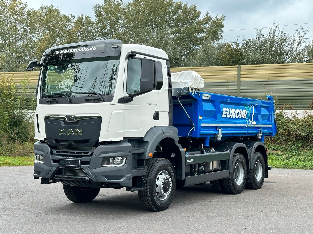 MAN TGS 33.440 6x6 /Euro6 3-Seiten-Kipper EuromixMTP - Camião basculante: foto 1 MAN TGS 33.440 6x6 /Euro6 3-Seiten-Kipper EuromixMTP - Camião basculante: foto 1