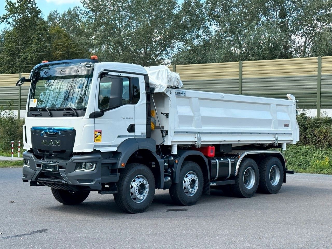MAN TGS 41.440 8x4 EuromixMTP 3-Seiten-Kipper - Camião basculante: foto 1 MAN TGS 41.440 8x4 EuromixMTP 3-Seiten-Kipper - Camião basculante: foto 1