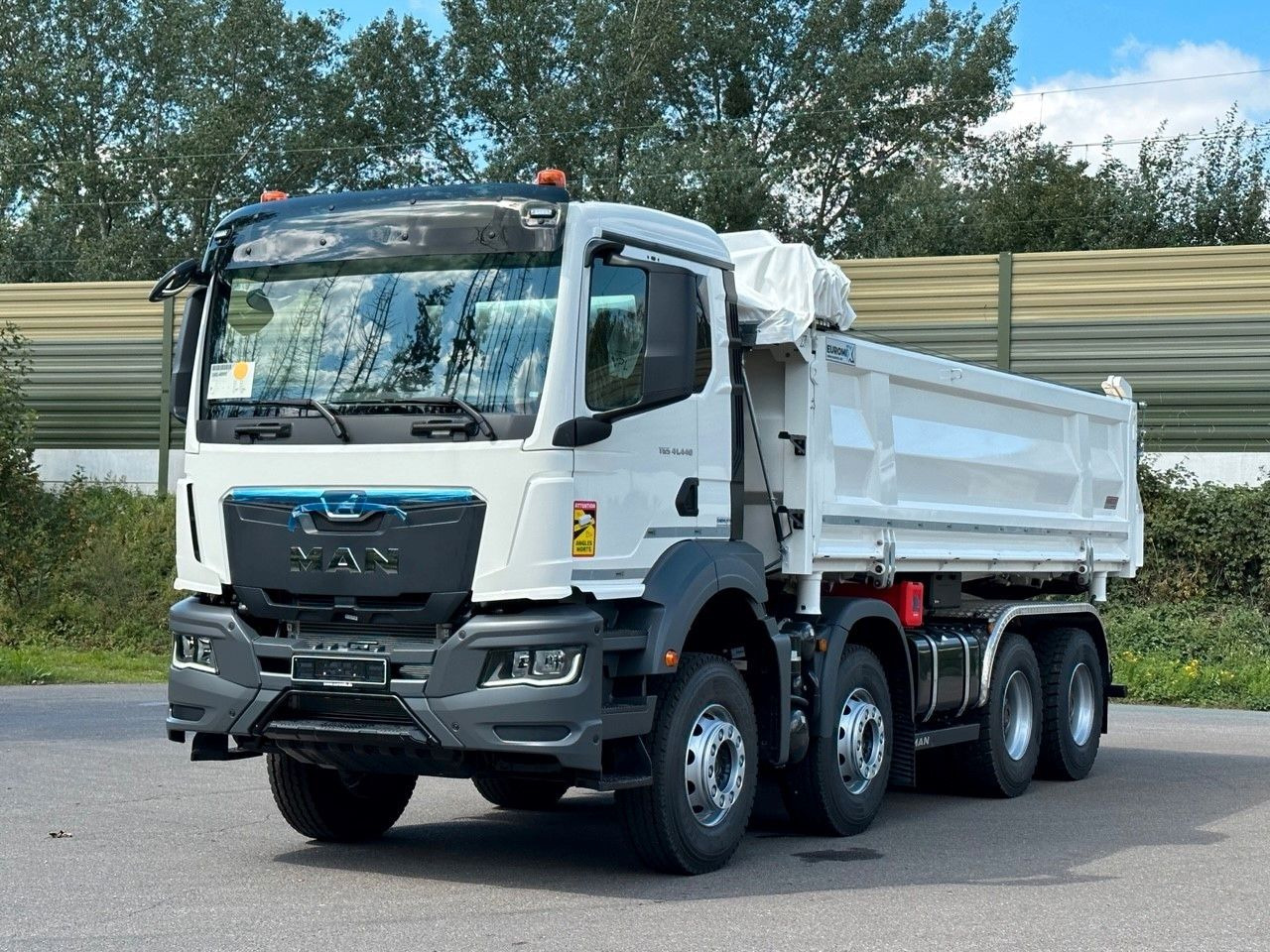 MAN TGS 41.440 8x4 EuromixMTP 3-Seiten-Kipper - Camião basculante: foto 1 MAN TGS 41.440 8x4 EuromixMTP 3-Seiten-Kipper - Camião basculante: foto 1